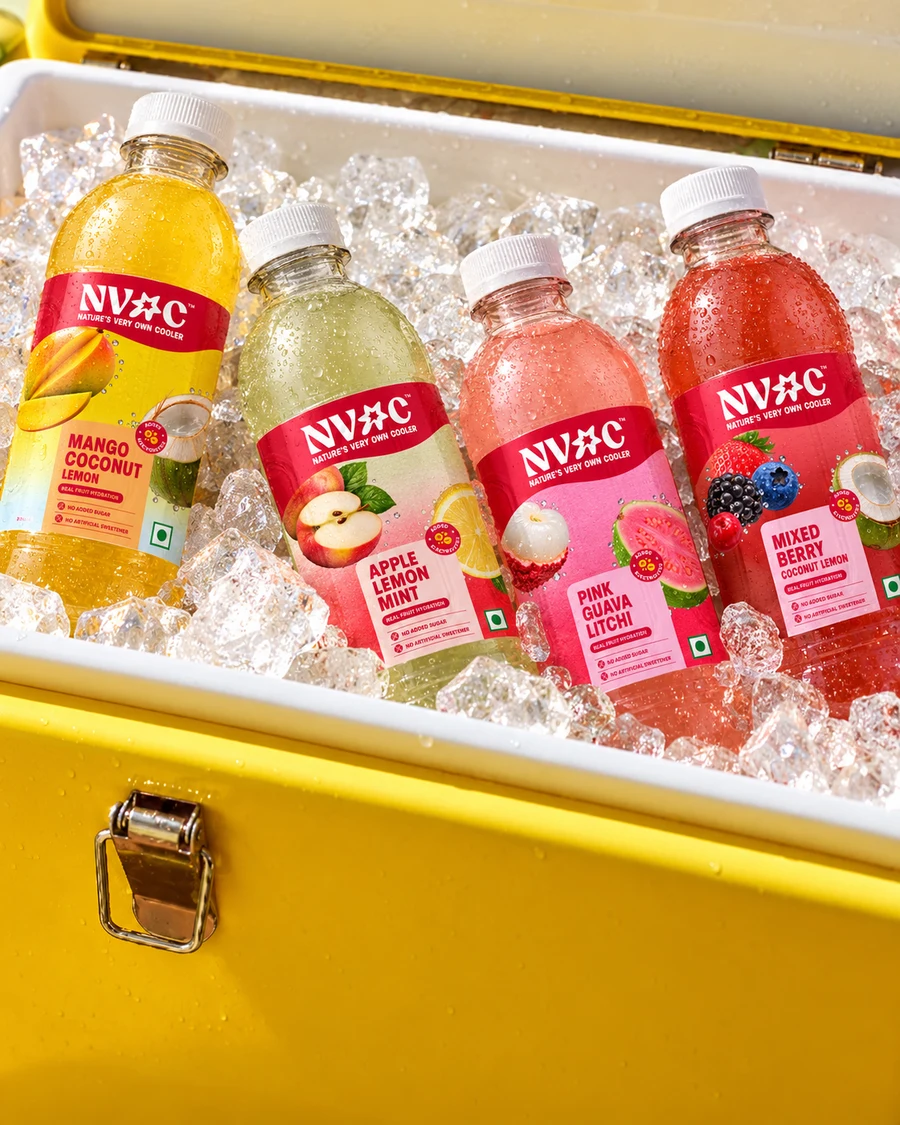 NVOC bottles chilled in ice inside a yellow cooler